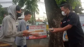 ASCA Gandeng Polisi Bagikan 1000 Takjil dan Santunan 