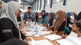 Foto: Pj Dani Ramdan Saat Berkunjung ke Gudang Logistik KPU