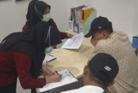Foto: Dani Bahdani Saat Proses Administrasi di Kejari Kota Bekasi