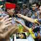 Foto: Ketua LSM GMBI Distrik Kota Bekasi, Abah Zakaria (Peci Merah)