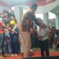 Teks Photo: Ketua MPC PP Kota Sukabumi, Melan Maulana Saat Berbagi Kebahagian Bersama Anak Yatim