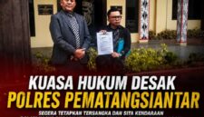 Photo: Tim Kuasa Hukum, Dr. Longser Sihombing, SH, MH bersama Heri Oktapian Sihombing.