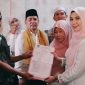 Photo: Anita Permatasari (Anita Amin Fauzi) Saat Mendaftar Calon Kepala Desa Kalijaya, Kabupaten Bekasi.