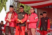 Photo: Kapolri Jenderal Listyo Sigit dan Wali Kota Semarang, Agustina Wilujeng P di Acara Muktamar XVI Tapak Suci. 