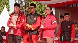 Photo: Kapolri Jenderal Listyo Sigit dan Wali Kota Semarang, Agustina Wilujeng P di Acara Muktamar XVI Tapak Suci. 