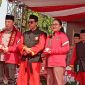 Photo: Kapolri Jenderal Listyo Sigit dan Wali Kota Semarang, Agustina Wilujeng P di Acara Muktamar XVI Tapak Suci. 