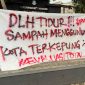 Teks Photo: Puluhan PC PMII Saat Mengelar UNRAS Di Depan Kantor DLH Kota Sukabumi