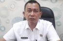 Photo: Kepala Dinas Lingkungan Hidup Kabupaten Bekasi, Syafri Donni Sirait.