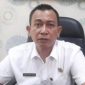 Photo: Kepala Dinas Lingkungan Hidup Kabupaten Bekasi, Syafri Donni Sirait.